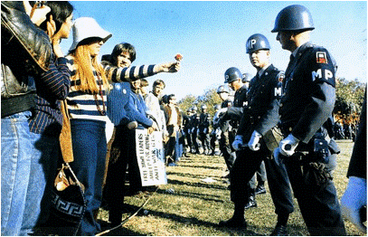 Female Demonstrator Offering a Flower to a Military Police Officer, 1967